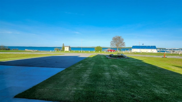 view of yard with a water view