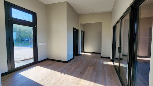 empty room with light wood-type flooring