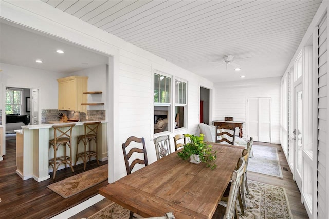 dining room featuring ceiling fan and hardwood / wood-style floors