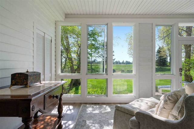 sunroom with wooden ceiling