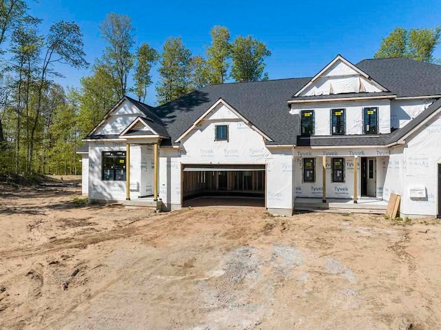 unfinished property with a garage