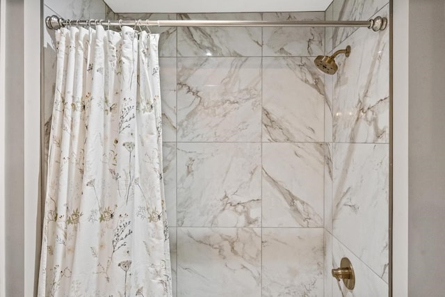 bathroom featuring a shower with curtain