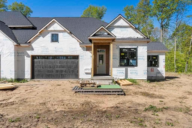 view of front of property with a garage