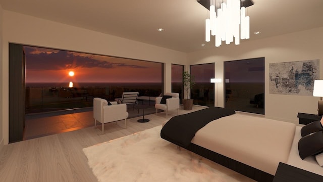 bedroom featuring hardwood / wood-style flooring and an inviting chandelier