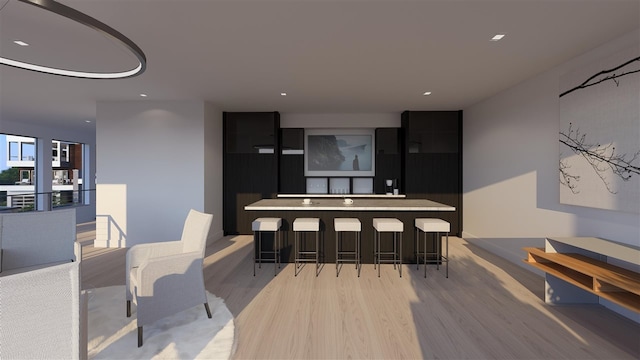 dining area featuring light wood-type flooring