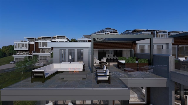 exterior space featuring a balcony, a patio area, and an outdoor living space