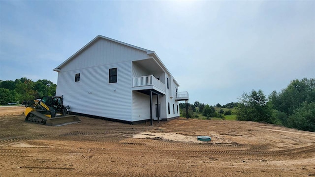 view of property exterior with a balcony