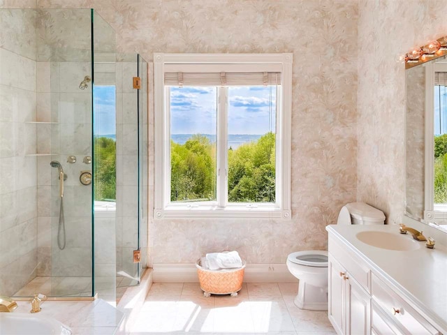 bathroom with a water view, an enclosed shower, tile floors, toilet, and vanity