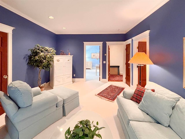 carpeted living room featuring ornamental molding