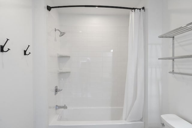 401 Antrim St, Charlevoix, MI 49720 - bathroom with shower / bathtub combination with curtain and toilet