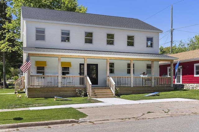401 Antrim St, Charlevoix, MI 49720 - view of front of property with a porch, a front lawn, and roof with shingles