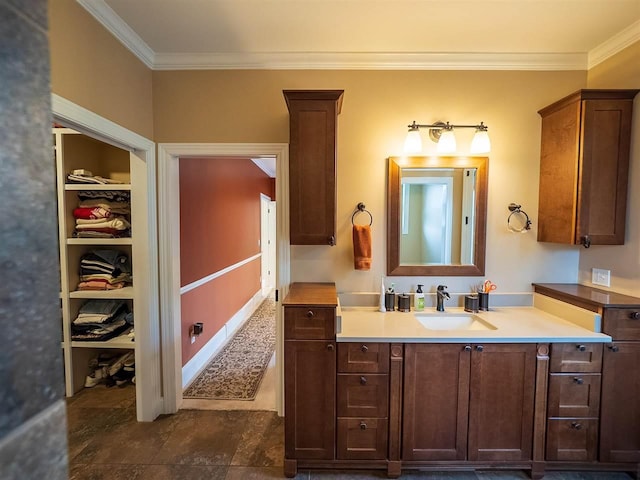 bathroom featuring vanity and crown molding