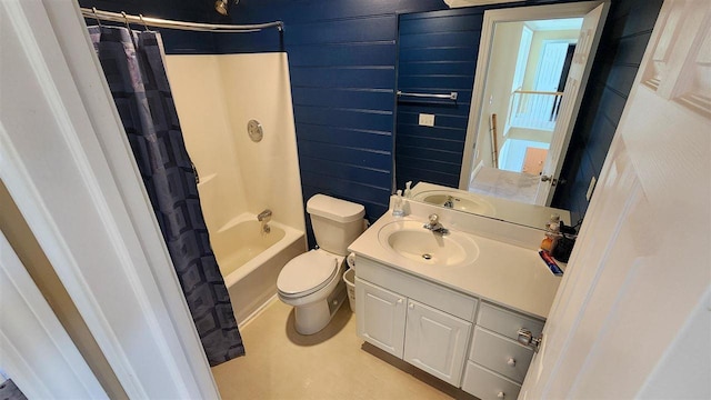 full bathroom featuring vanity, shower / bath combination with curtain, and toilet