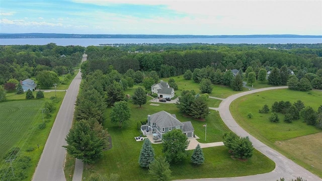 drone / aerial view featuring a rural view and a water view