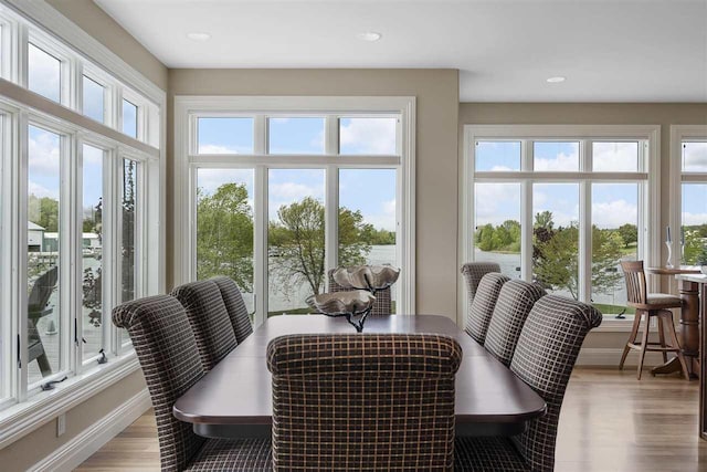 1439 Lindburgh Ln, Cheboygan, MI 49721 - dining area with healthy amount of natural light, wood finished floors, and recessed lighting