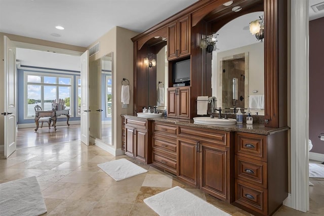 1439 Lindburgh Ln, Cheboygan, MI 49721 - full bathroom featuring double vanity, recessed lighting, and tile patterned floors