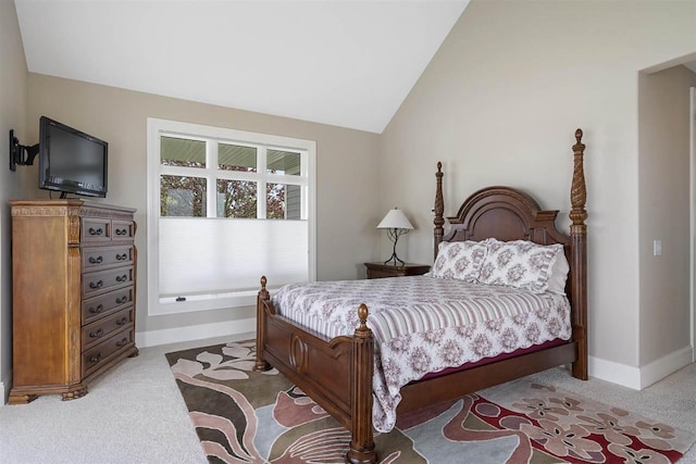 1439 Lindburgh Ln, Cheboygan, MI 49721 - bedroom featuring light carpet and vaulted ceiling
