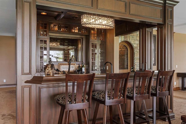 1439 Lindburgh Ln, Cheboygan, MI 49721 - indoor wet bar with carpet and a chandelier