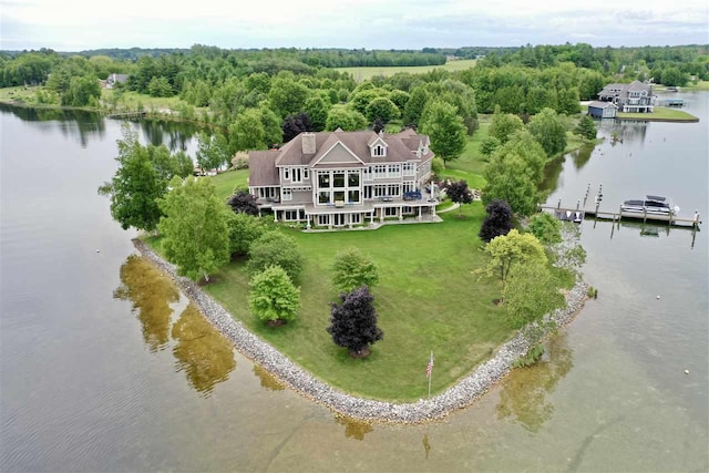 1439 Lindburgh Ln, Cheboygan, MI 49721 - view of subject property with a nearby body of water and a forest