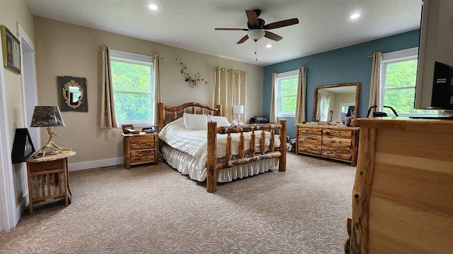 bedroom with ceiling fan and carpet