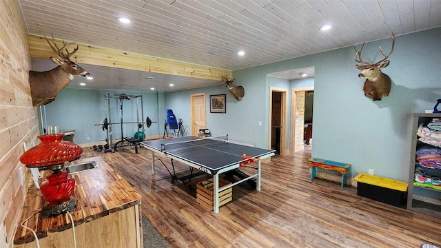 game room with wood-type flooring