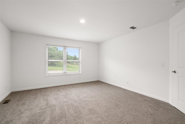 unfurnished room with carpet floors