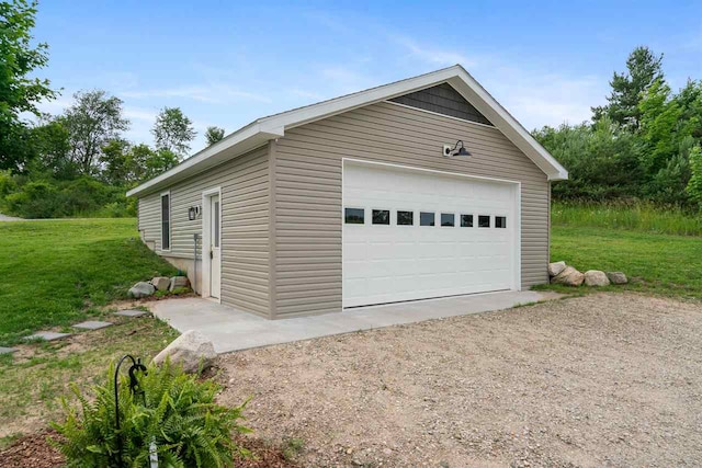 garage with a lawn