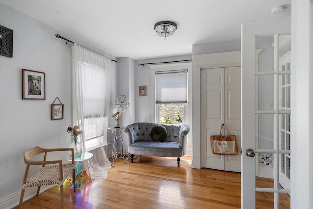 living area featuring hardwood / wood-style floors