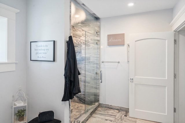 bathroom with an enclosed shower