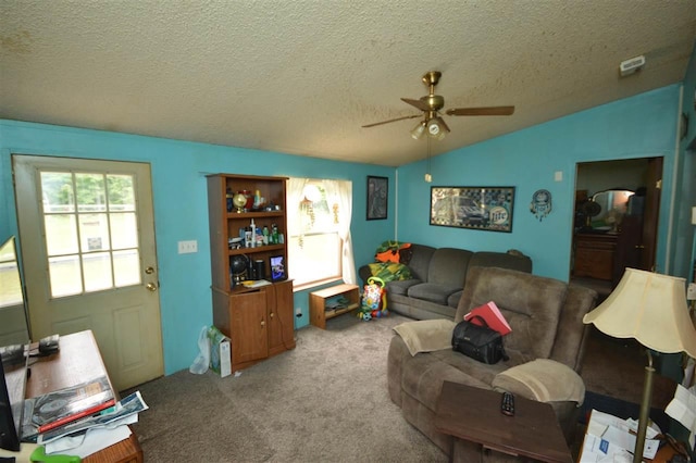 living room featuring carpet flooring, ceiling fan, a textured ceiling, and vaulted ceiling