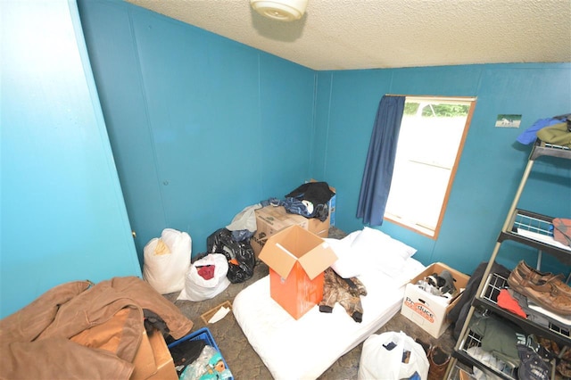 bedroom featuring a textured ceiling