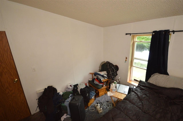 unfurnished bedroom featuring a textured ceiling