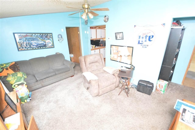 carpeted living room with ceiling fan, a textured ceiling, and vaulted ceiling