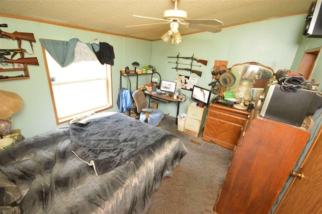 carpeted bedroom with ceiling fan, crown molding, and a textured ceiling