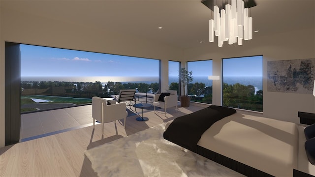 bedroom with an inviting chandelier and wood-type flooring