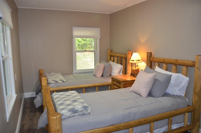 2690 E Lake St, Harbor Springs, MI 49740 - bedroom featuring ornamental molding and dark hardwood / wood-style floors