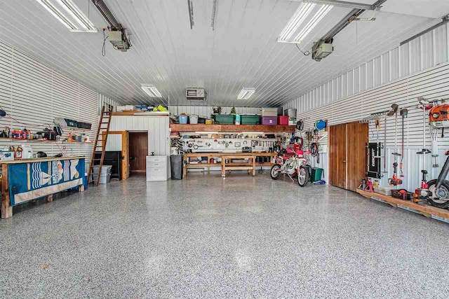 garage with a workshop area