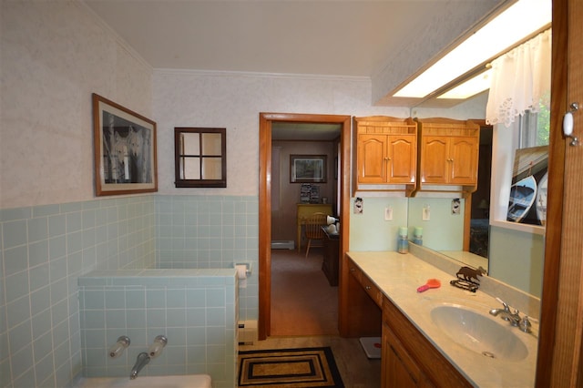 bathroom featuring vanity, tile walls, a bathing tub, and tile patterned flooring