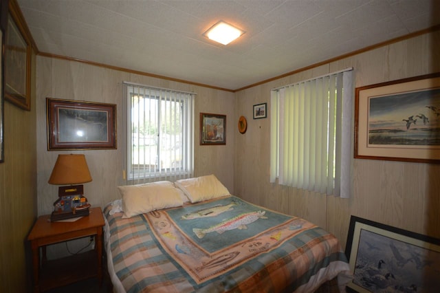 bedroom with ornamental molding