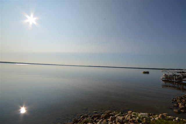 property view of water featuring a boat dock