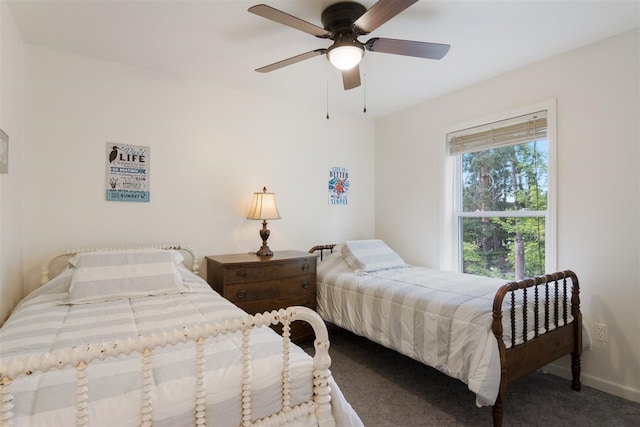 bedroom featuring ceiling fan and carpet flooring