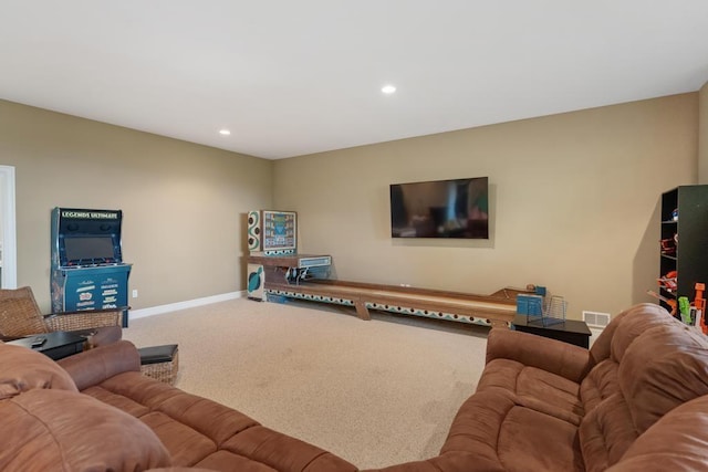 carpeted living room with visible vents, baseboards, and recessed lighting