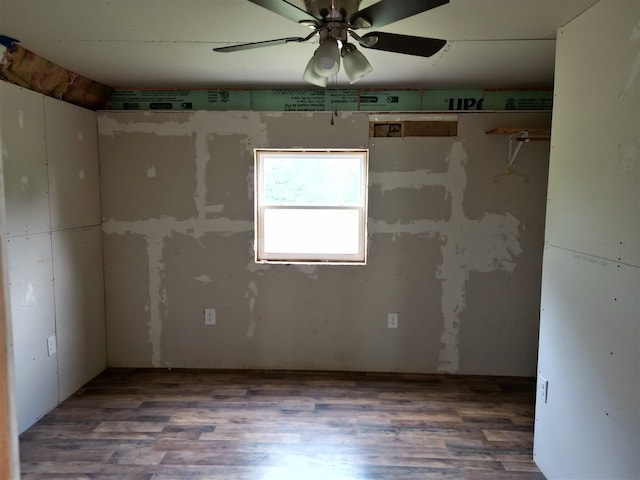 empty room featuring hardwood / wood-style flooring and ceiling fan