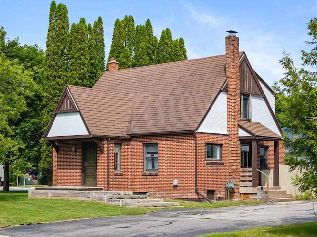 view of tudor-style house