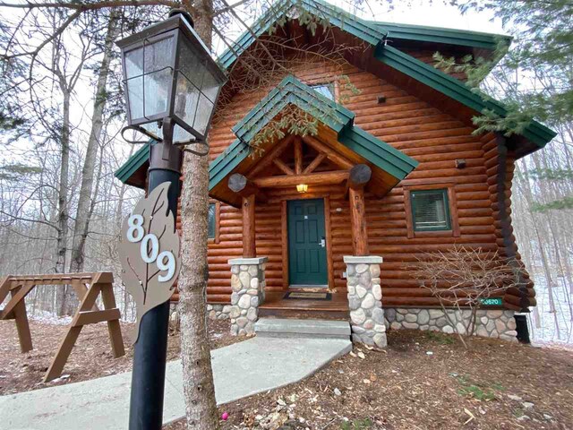 view of log home