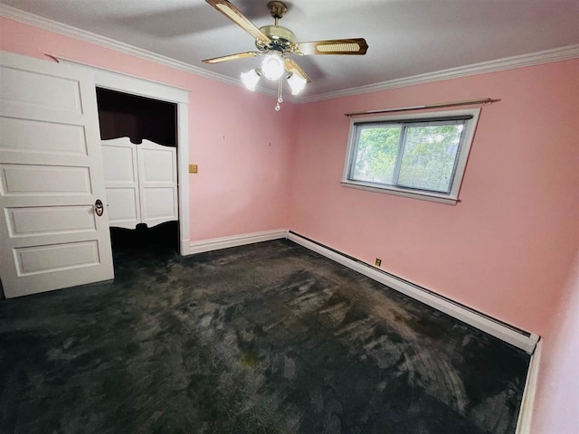 unfurnished bedroom featuring crown molding, dark carpet, ceiling fan, and a closet