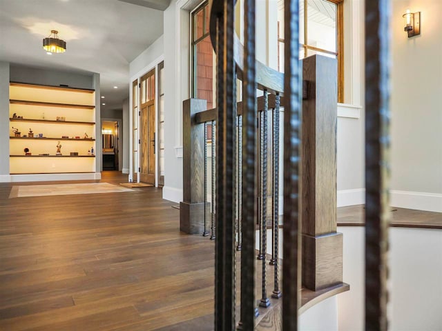 11305 Evergreen Ln, Charlevoix, MI 49720 - hall with wood finished floors and baseboards