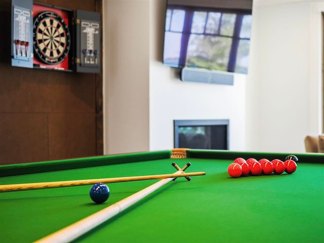 11305 Evergreen Ln, Charlevoix, MI 49720 - game room featuring billiards table and a fireplace