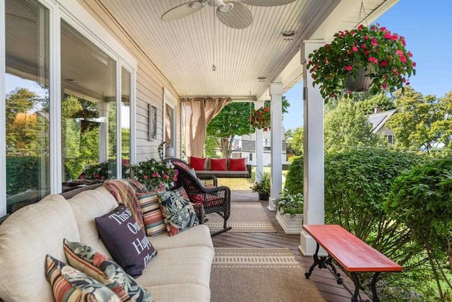 view of patio / terrace featuring an outdoor living space, covered porch, and ceiling fan