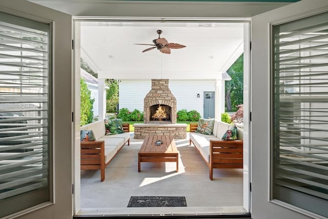 view of patio / terrace featuring an outdoor living space with a fireplace